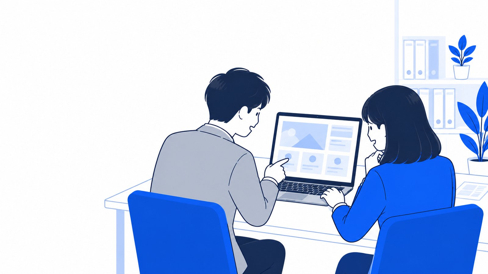 小さな事務所で、経営者と事務担当者が1台のノートPCを一緒に見ながら導入について話し合っている