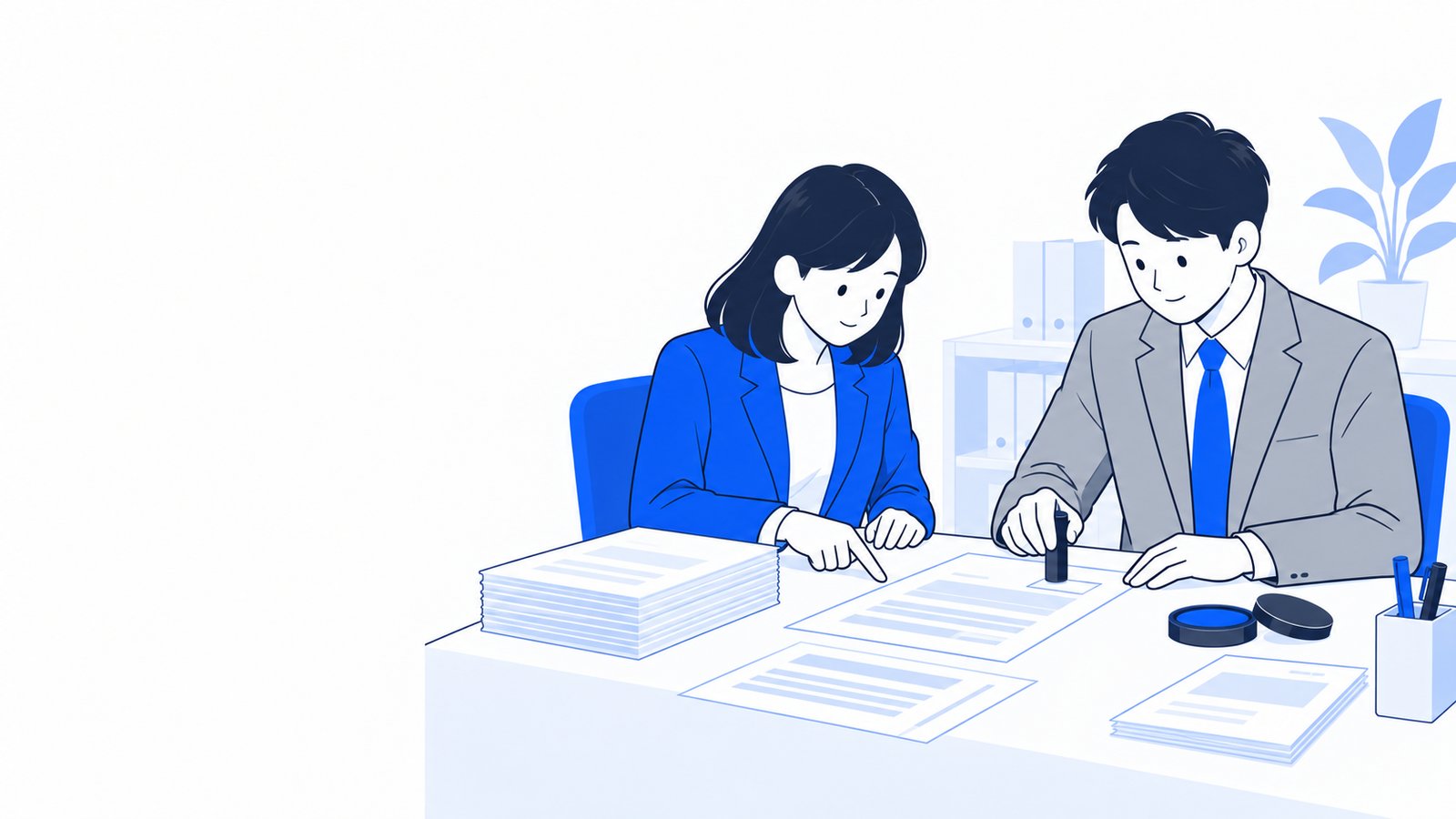 書類の内容を確認する担当者と、承認の印を押す上司