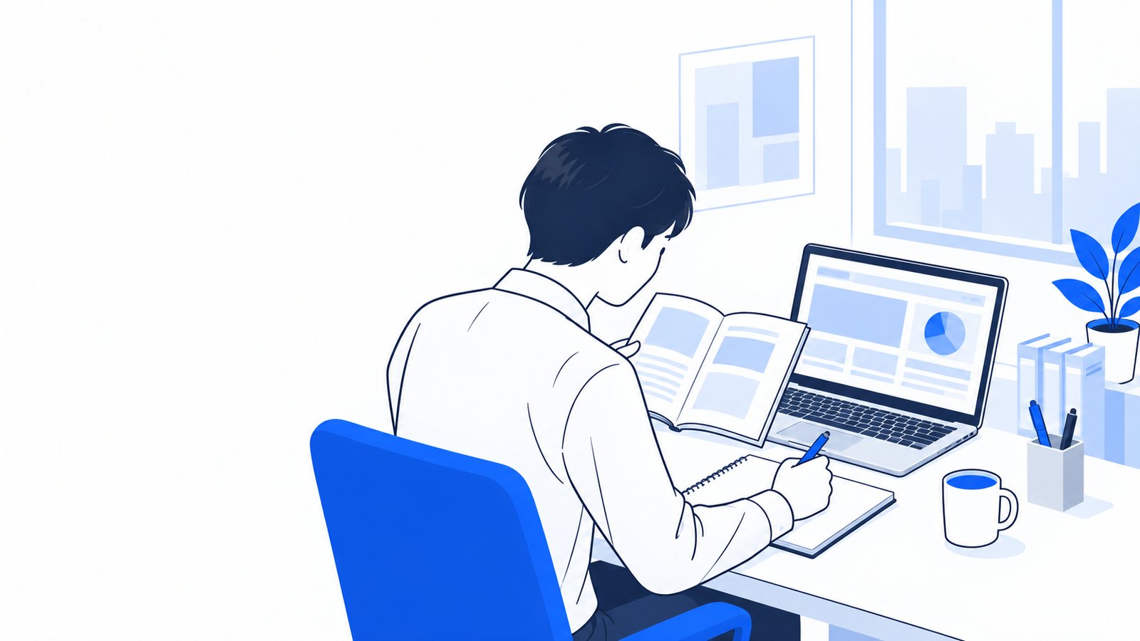 ノートPCを開いたデスクで、入門書を読みながらメモを取る担当者