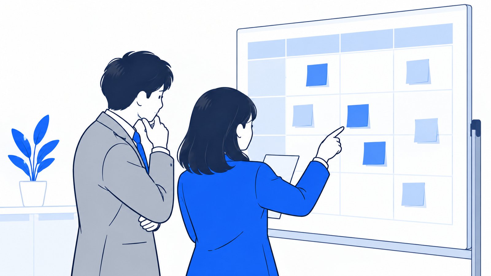 付箋を貼った評価シートを前に、2人の担当者が試した結果を見比べている様子