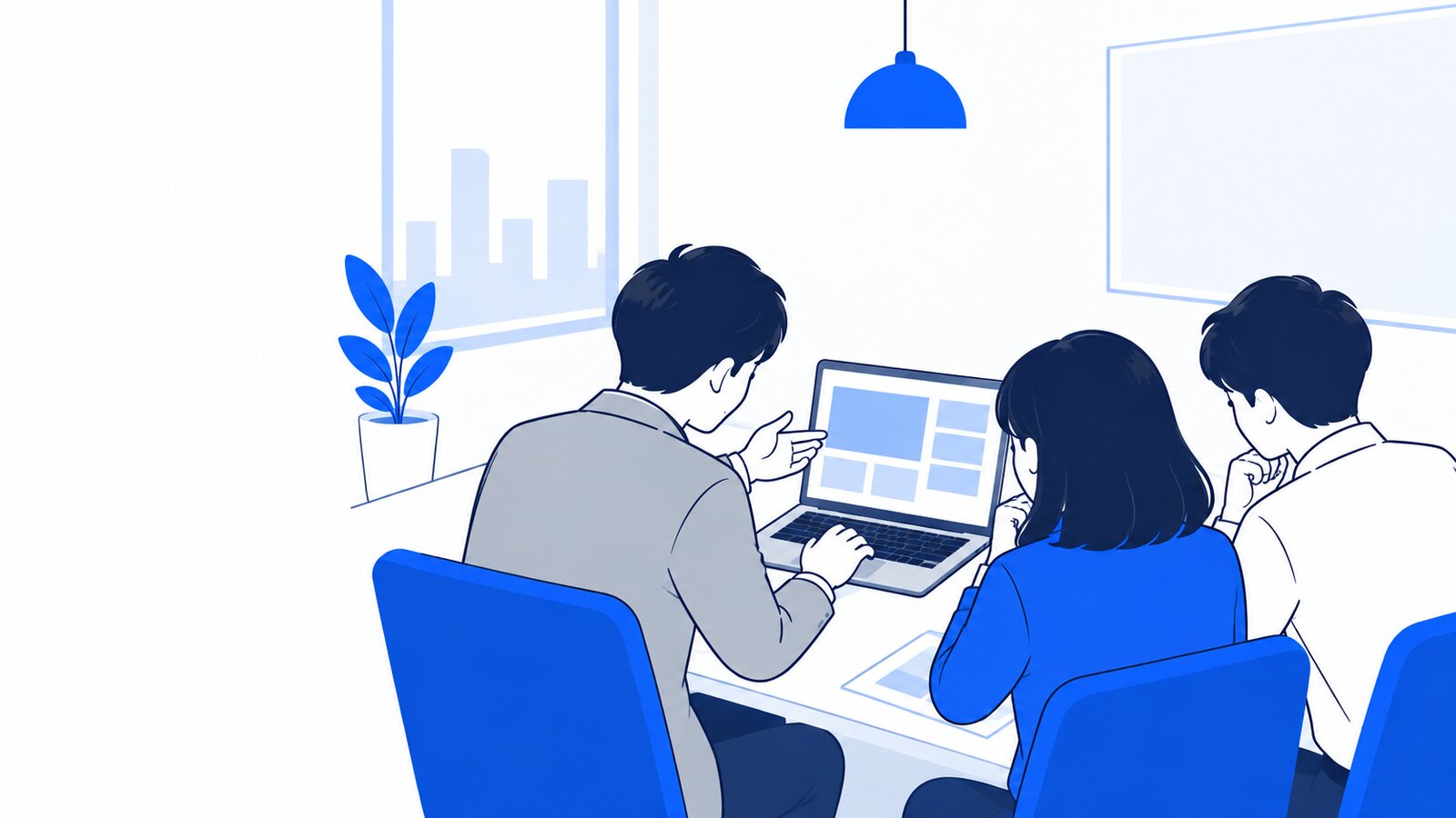 会議室で情報システム担当者がPCを操作しながら、社員に導入手順を説明している場面