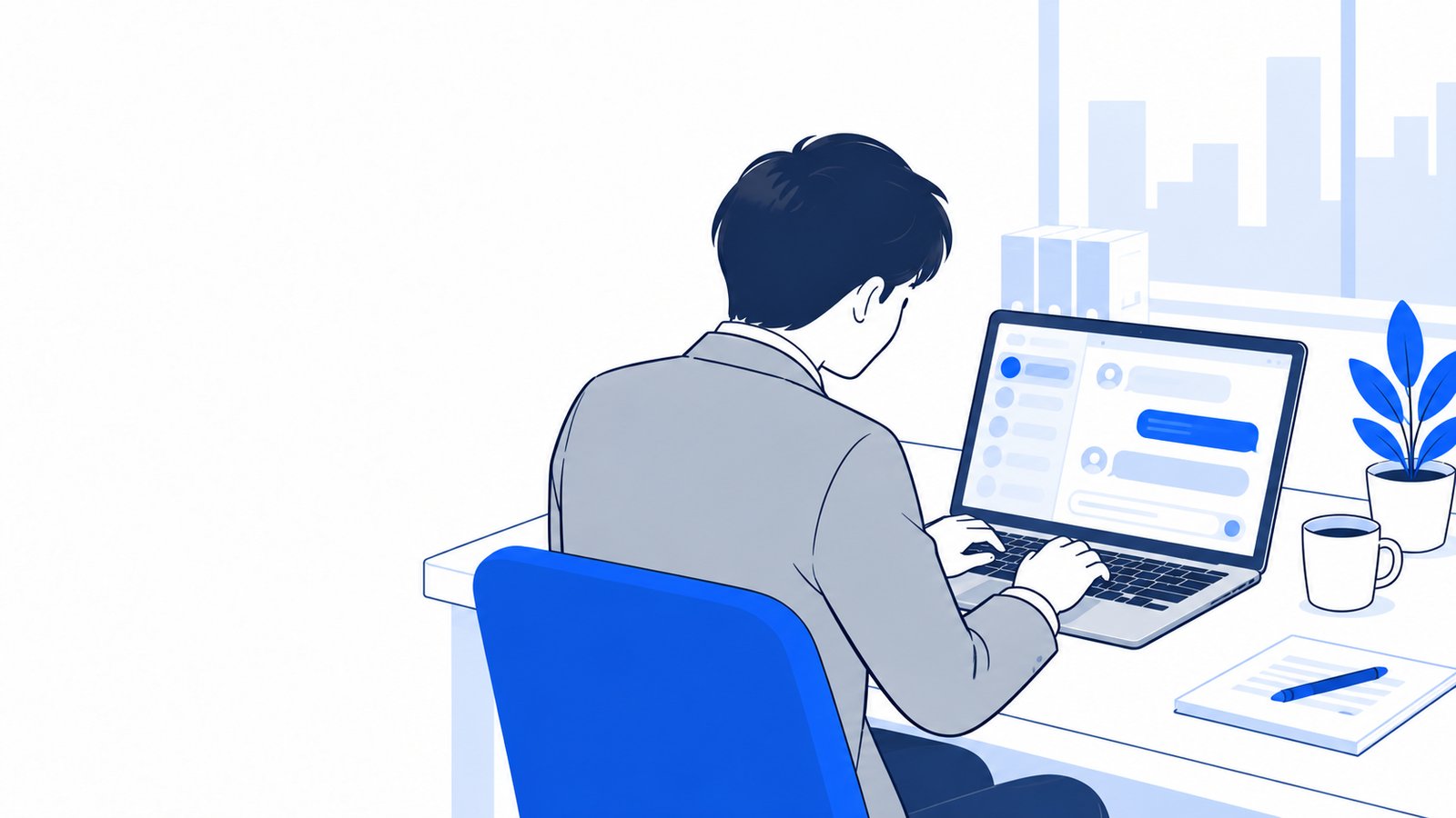 デスクでノートPCのサポート画面に向かい、メッセージを入力する会社員