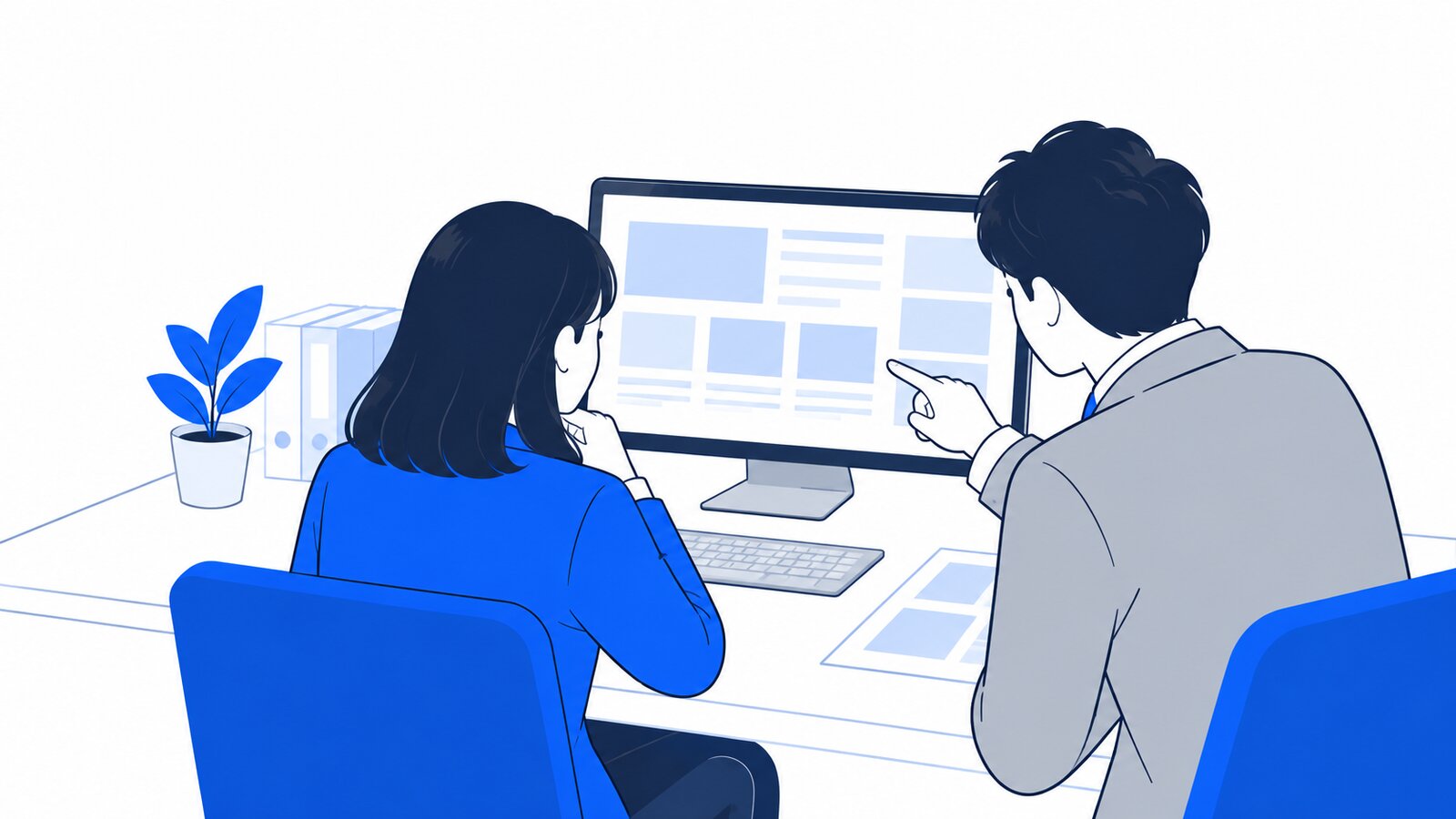 画面の説明を読みながら同僚と相談する担当者