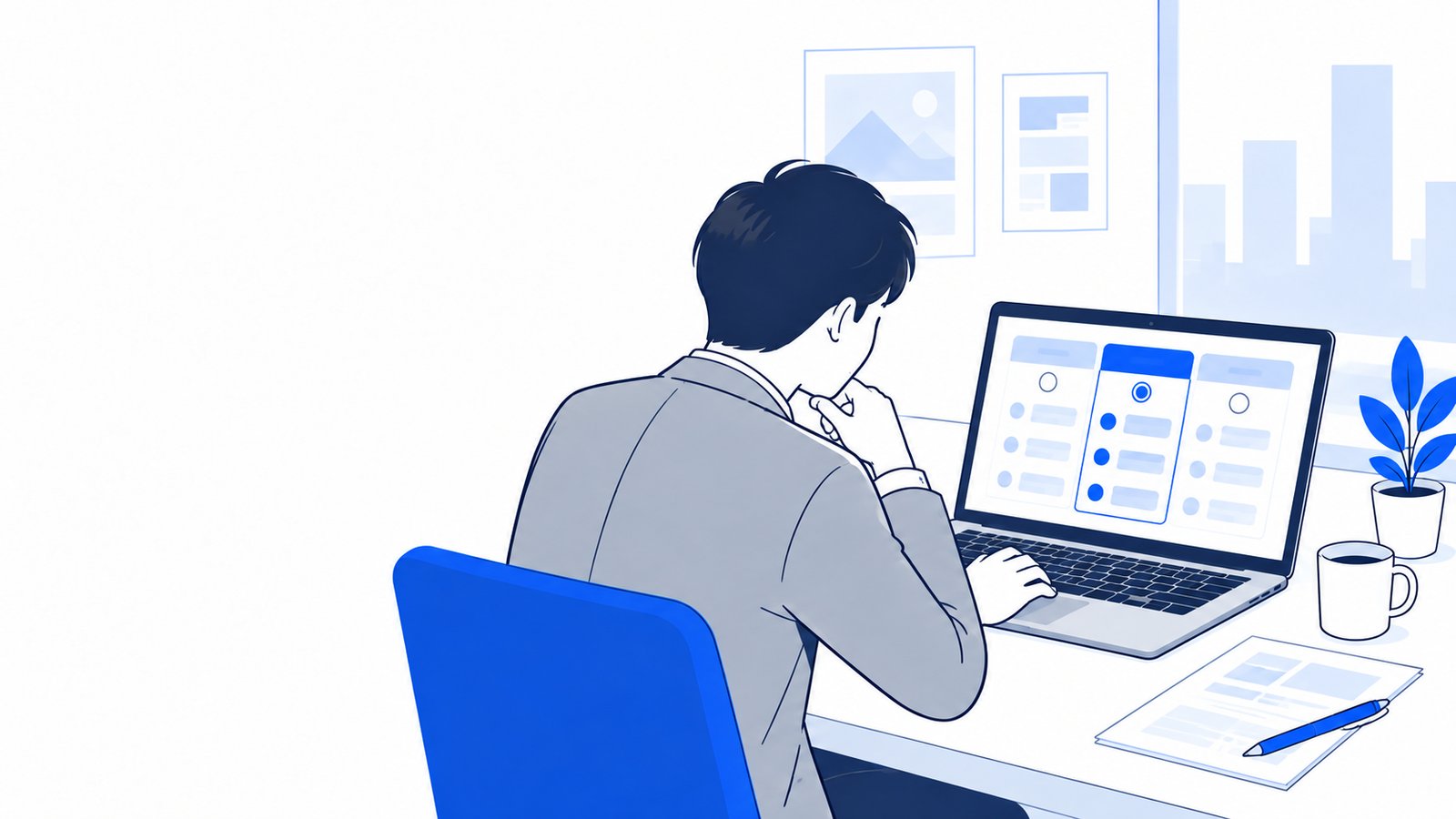ノートPCでモデルの一覧を見比べて、どれを使うか考えている会社員