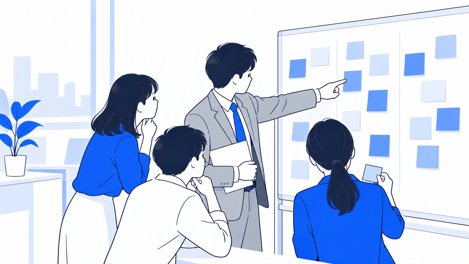 付箋を貼った表を指さして、使うスキルを決める部署のメンバー