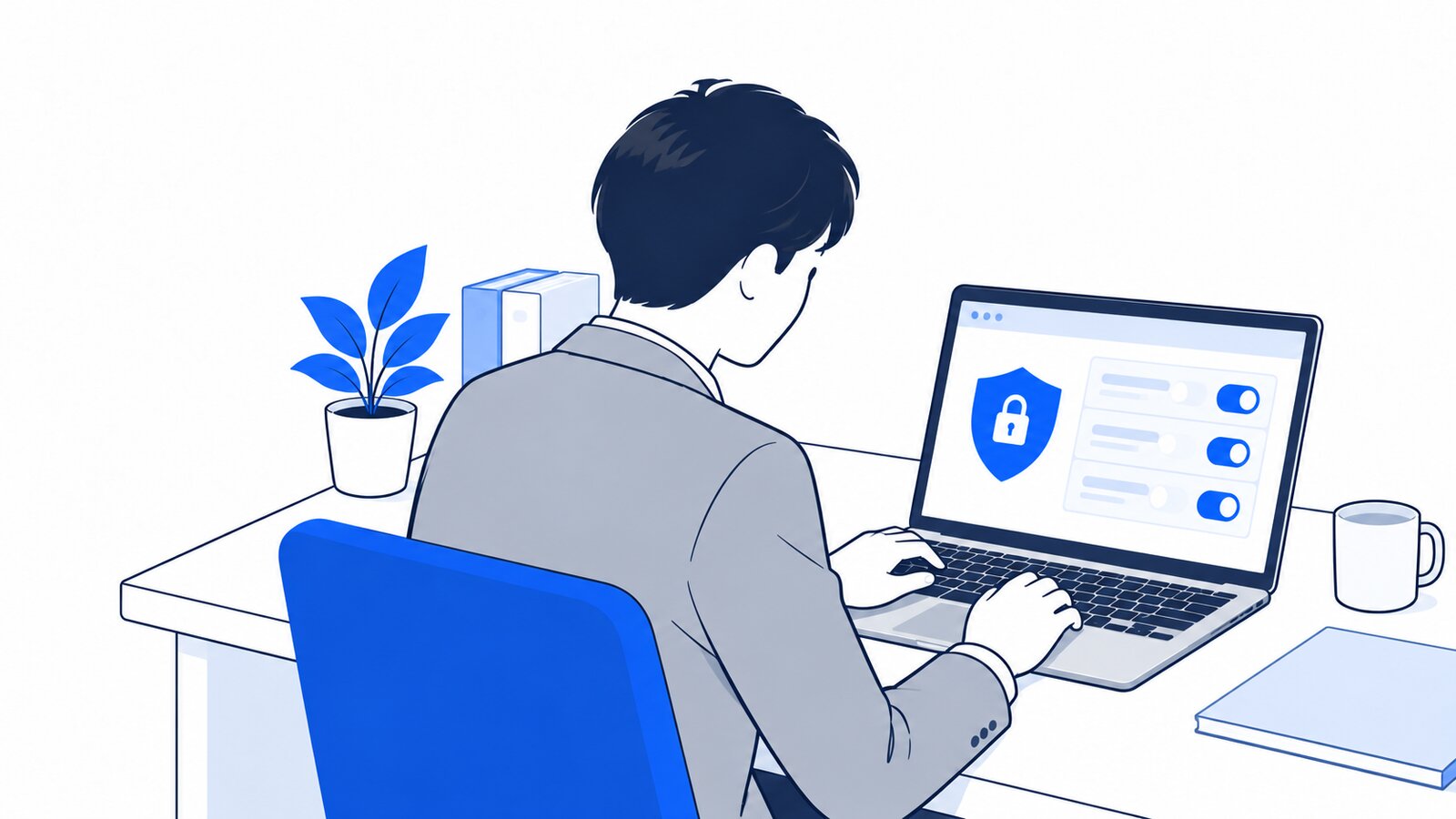 情報システム担当者がノートPCでセキュリティの設定画面を確認している