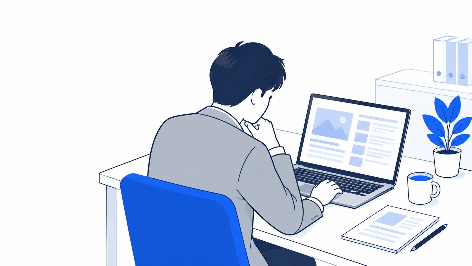 オフィスの自席で、ノートPCに表示したニュースを読む担当者