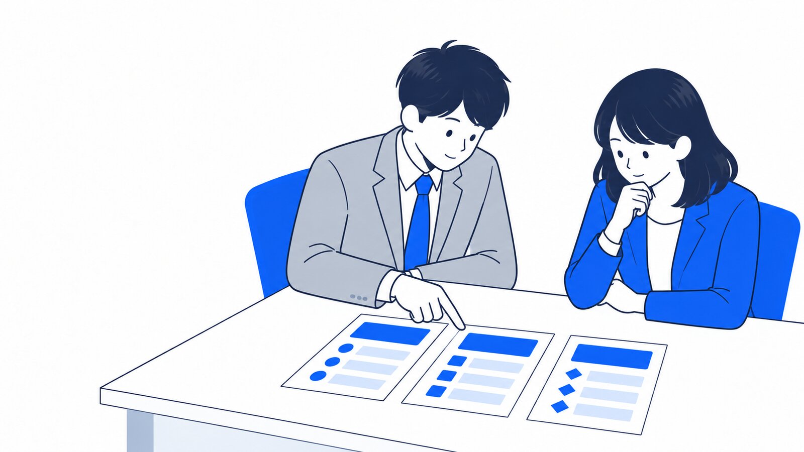 料金プランのカードを机に並べて比べながら相談する二人の会社員