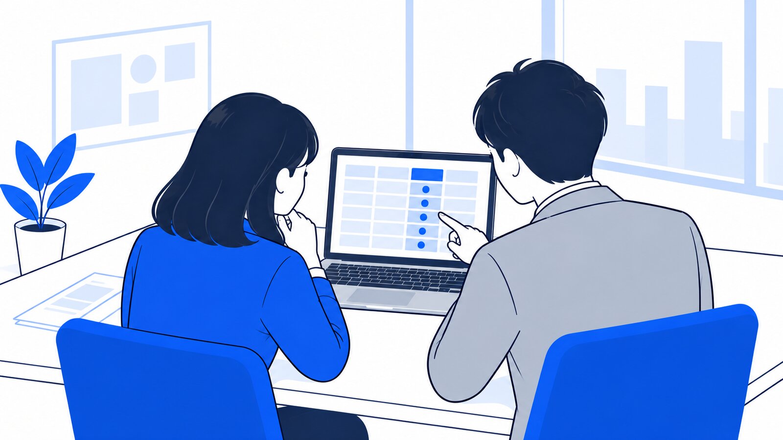 会議室でノートPCの比較表を見ながらプランを相談する二人