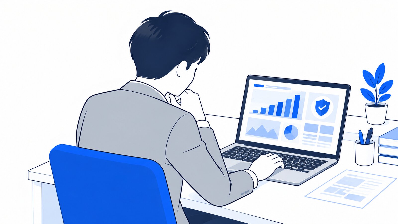 セキュリティ担当者がノートPCで分析結果を確認している様子を、肩越しに見る構図