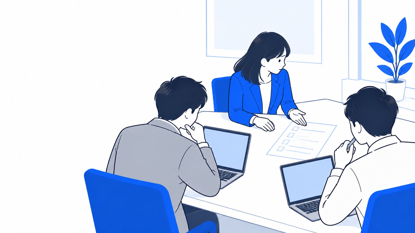会議室でノートPCを開いたまま、利用ルールを話し合う数人