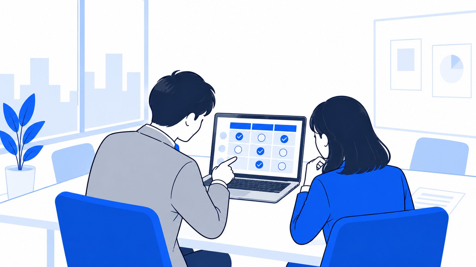 会議室でノートPCの比較表を見ながらプランを相談する二人