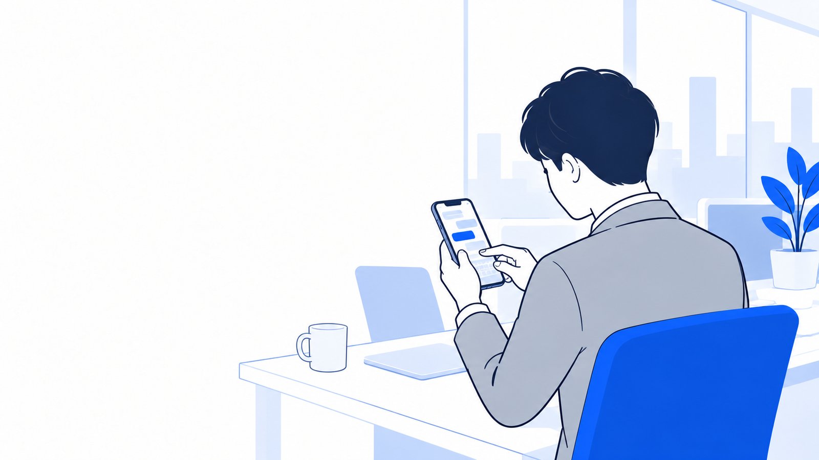 スマホに届いた通知を確認して、返事の文章を入力する会社員
