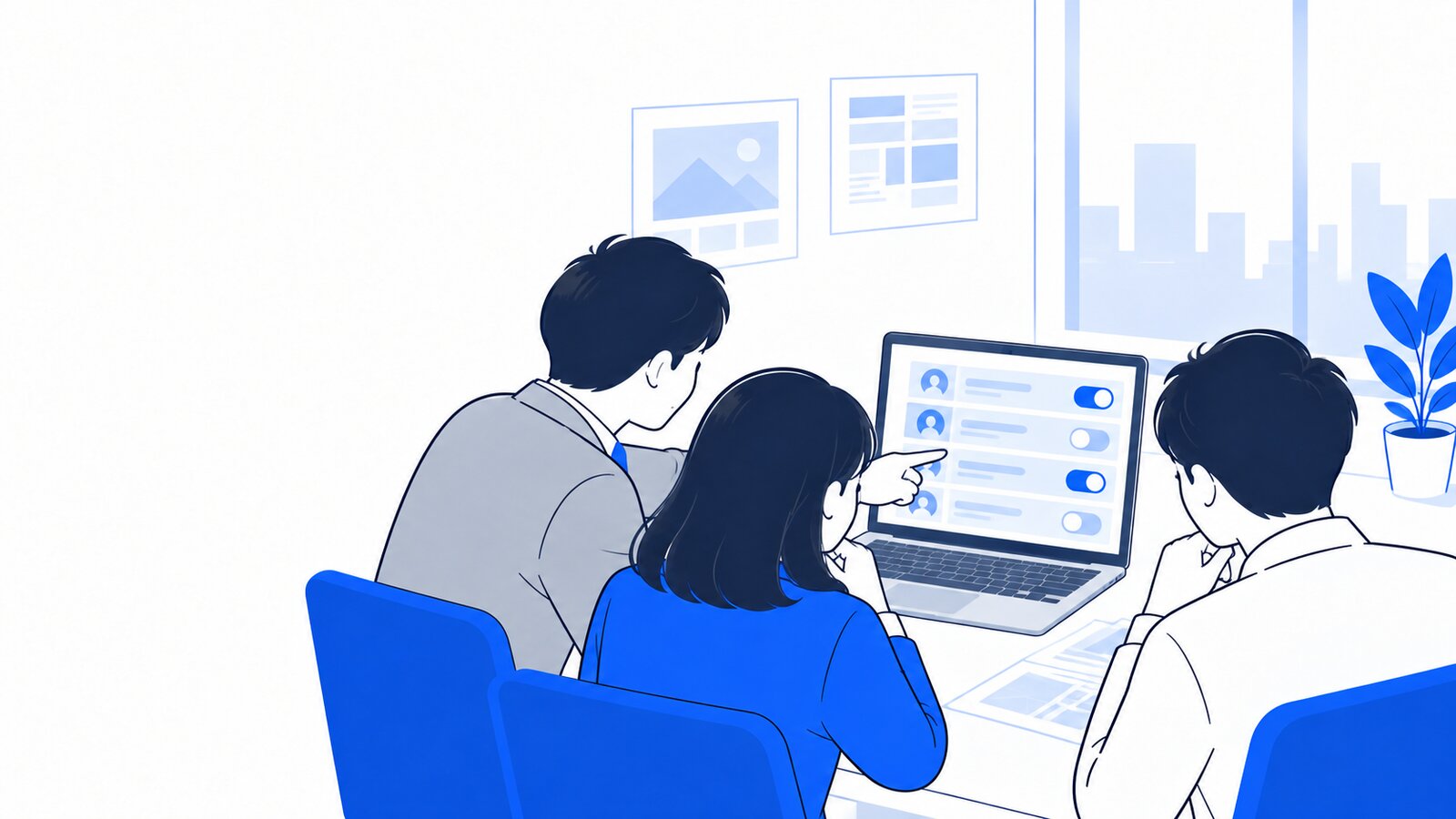 会議室で管理担当がノートPCを見ながら、同僚にスキルの共有の設定を説明している場面