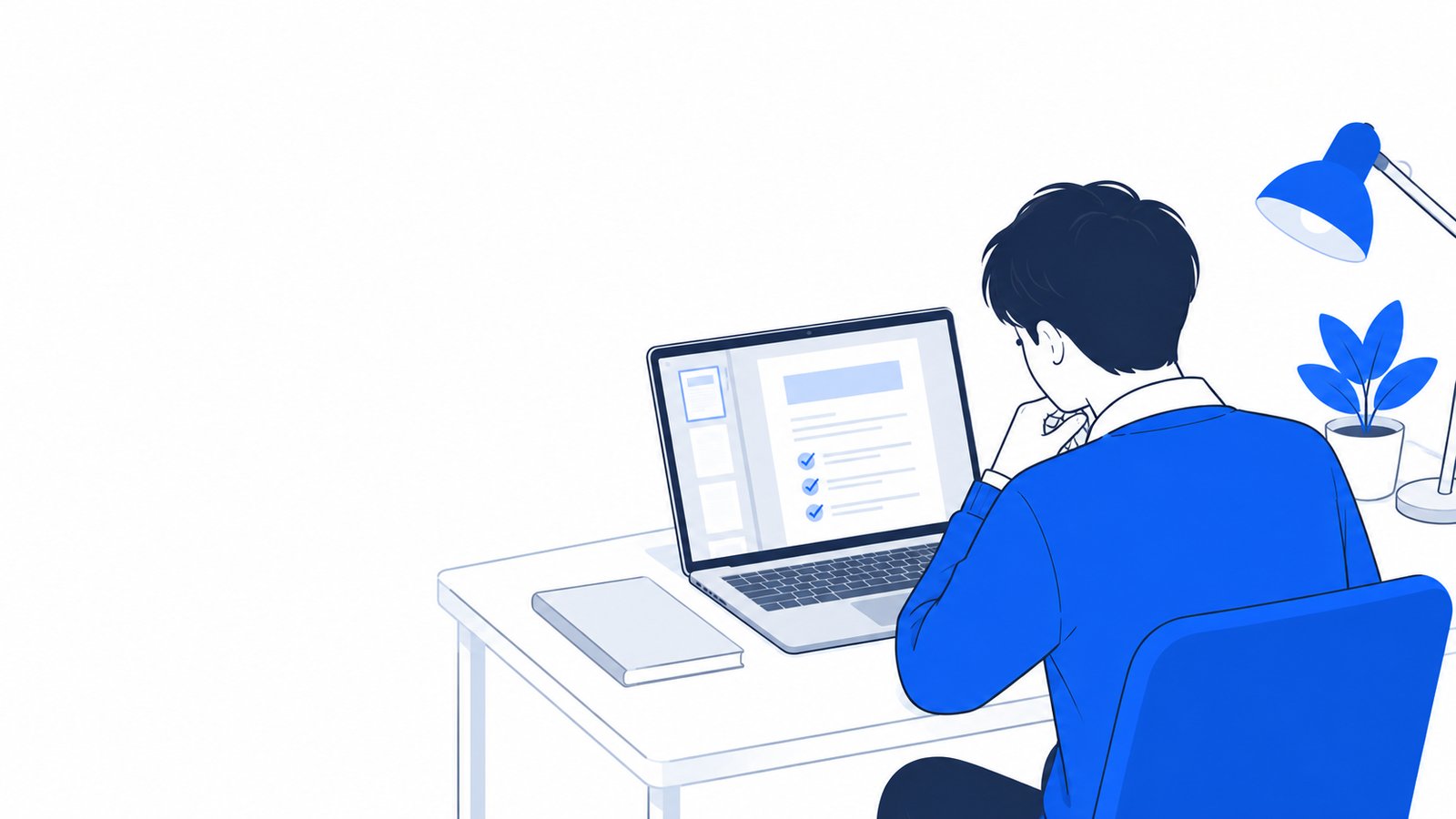 ノートPCでレポート用の資料のPDFを読み込ませて要点を確かめる学生
