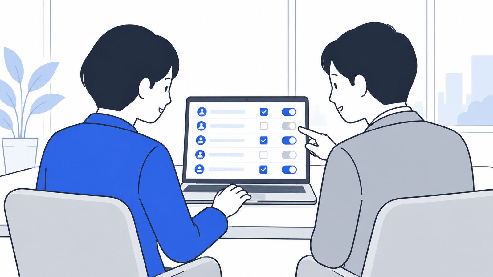 会議室で、自分のPCの権限設定の画面を見ながら上司と確認する担当者