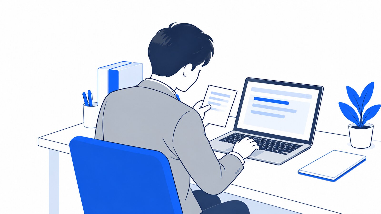 メモを見ながらノートPCで依頼文を短く整える会社員