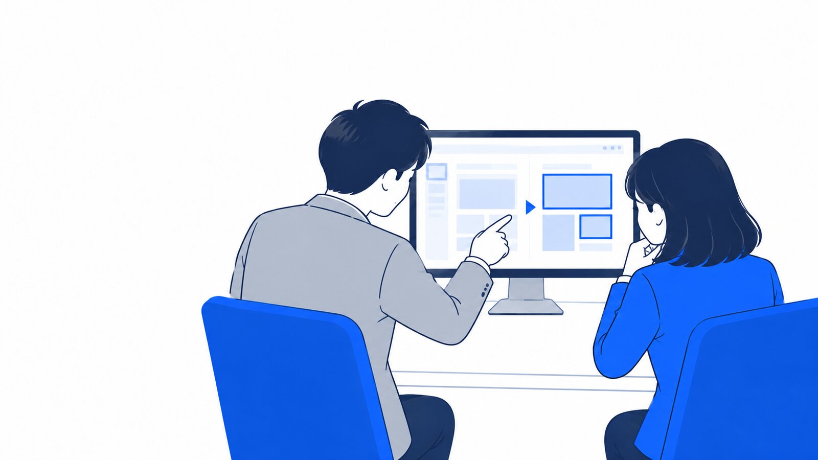 エンジニアと事務担当がモニターに表示された変更点を一緒に確認している
