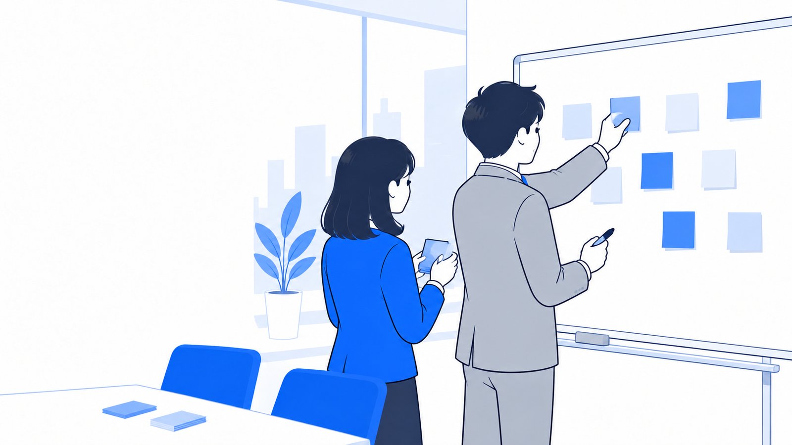 付箋にルールの項目を書き出してホワイトボードに貼る会社員
